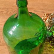 Superb antique green glass demijohn.