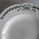 4 assiettes semi creuses terre de fer Longchamp