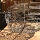 Old egg basket in metal shape round metal handle