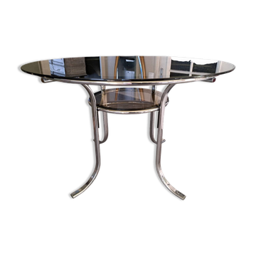 Round table in chromed metal and smoked glass