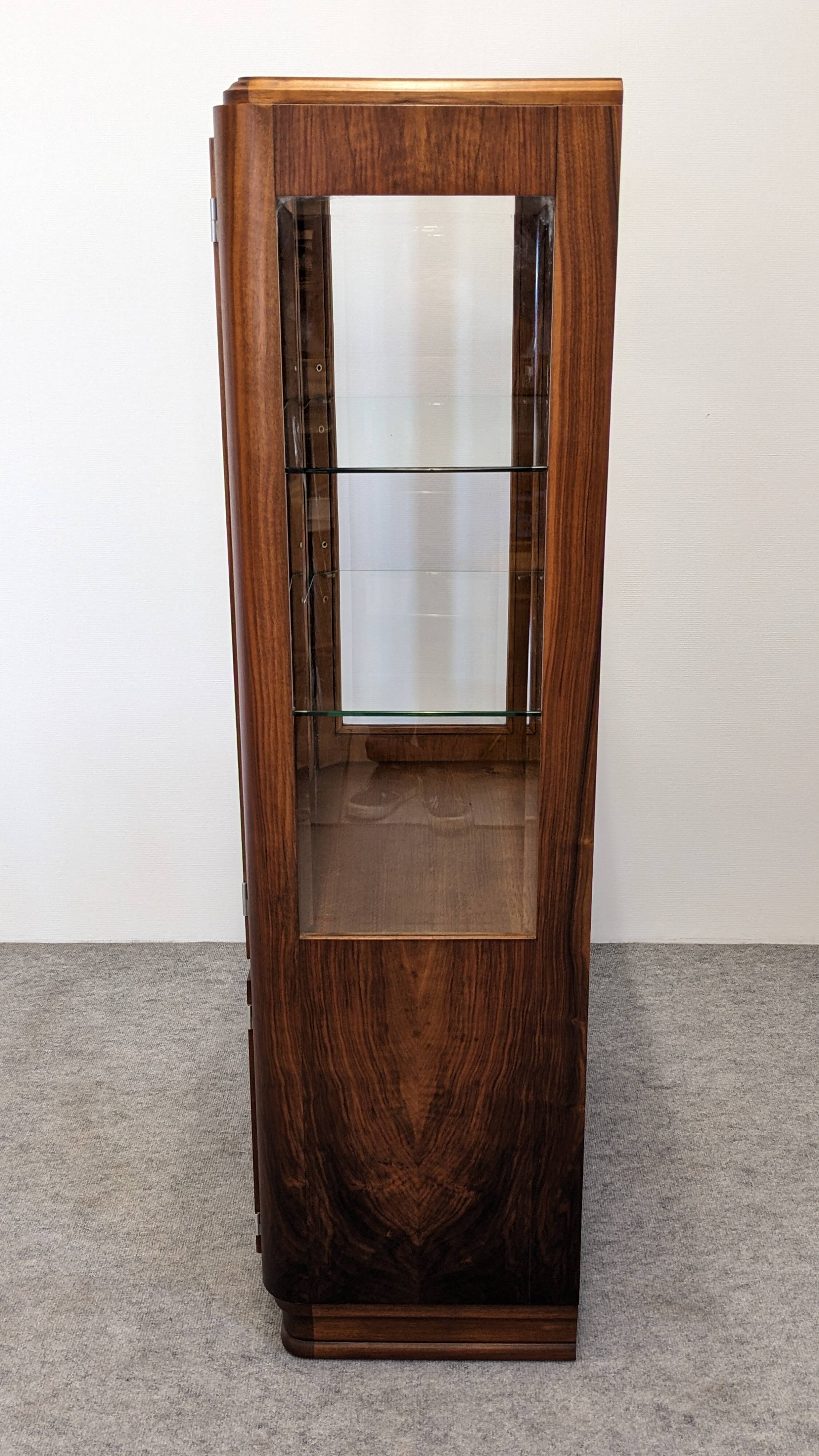 Art Deco walnut burl display cabinet, France circa 1930.
