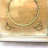 Empire square frame, in gilded bronze, Louis XVI knots, photo medallion