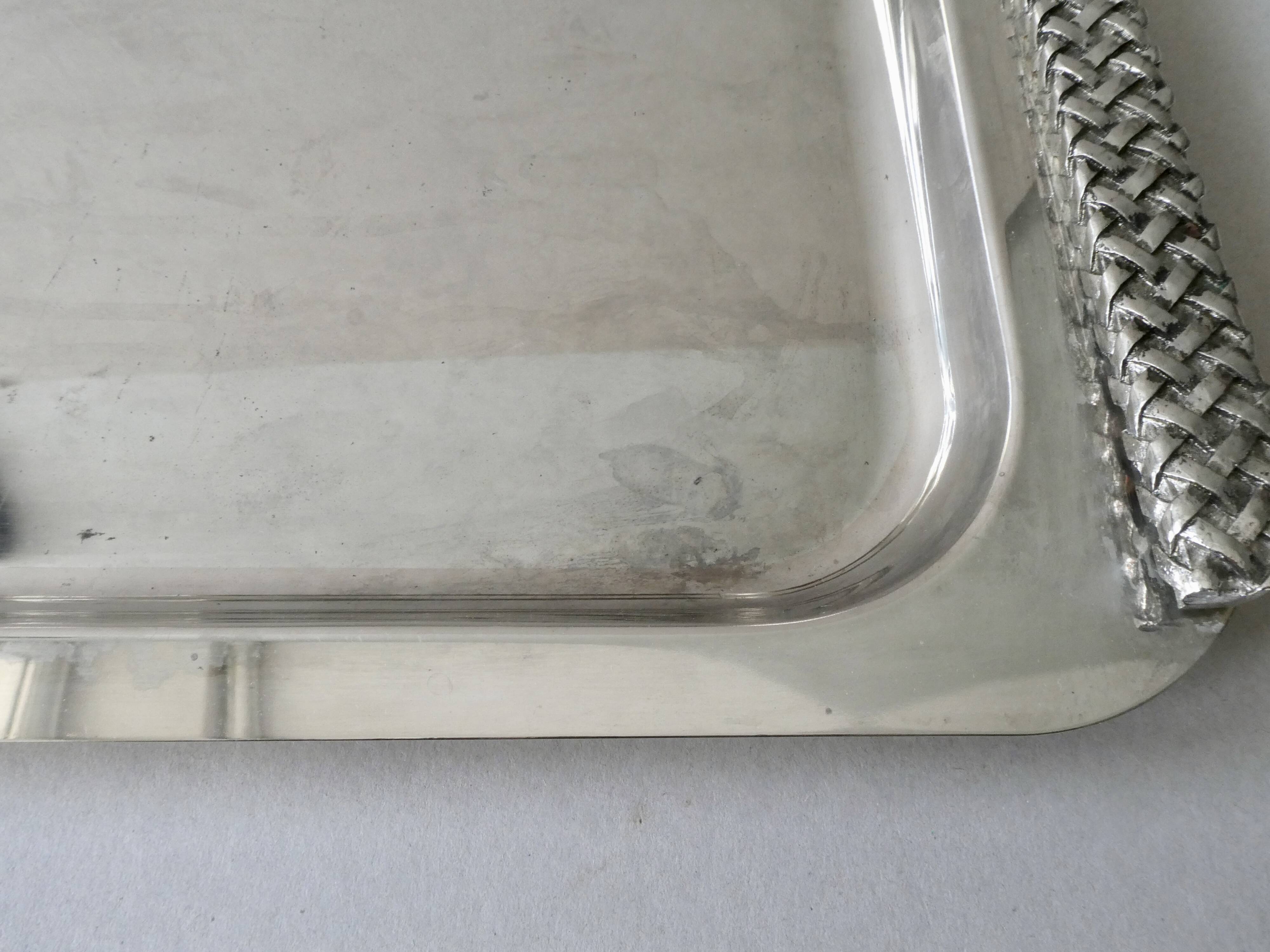 Silver metal tray with braided effect handles