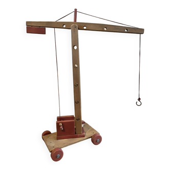 Old wooden crane game