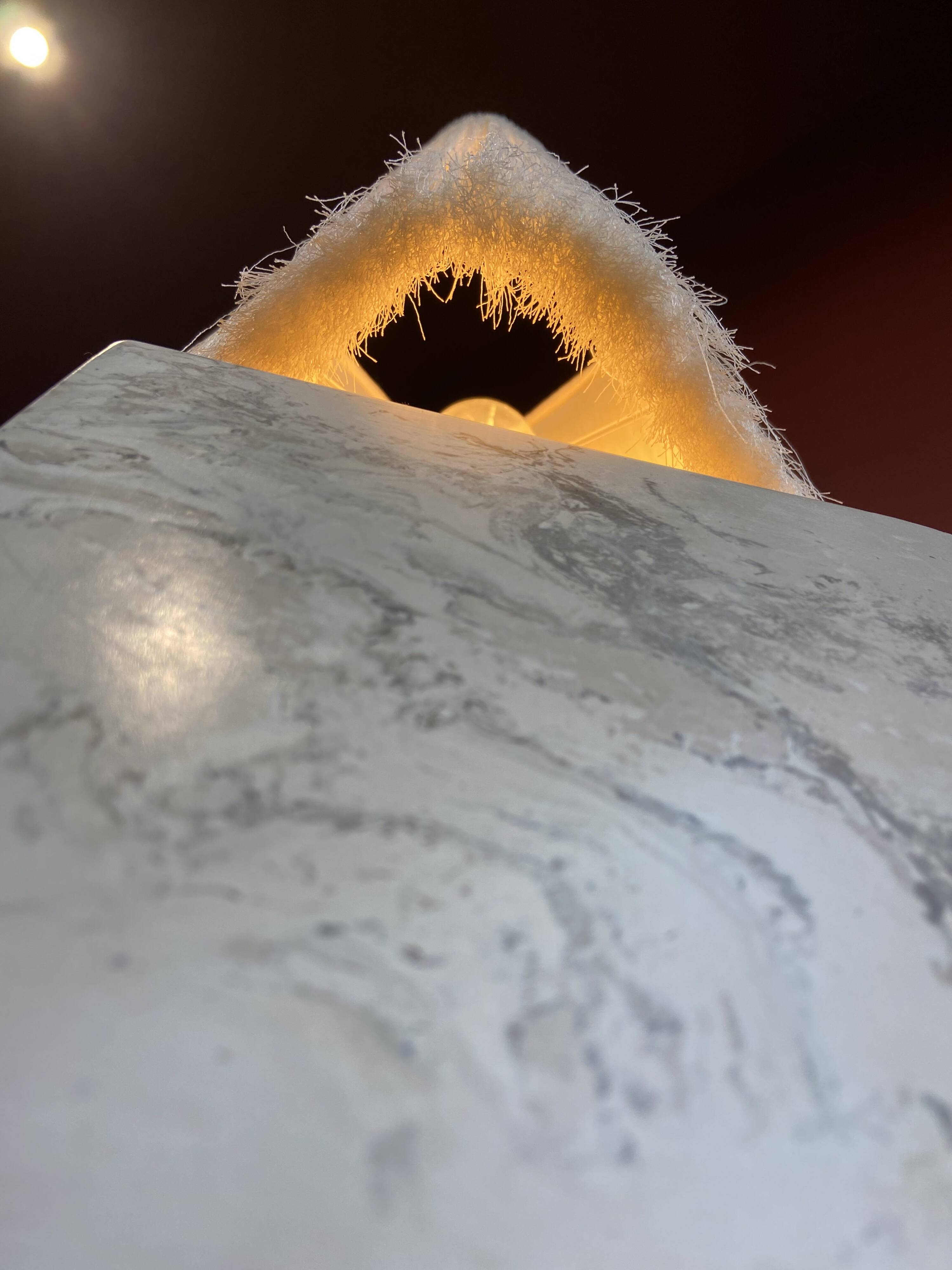 Beige marble stucco base, Houles white ecru fringed lampshade.