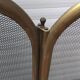 Neoclassical style fire screen with 4 panels and mesh.