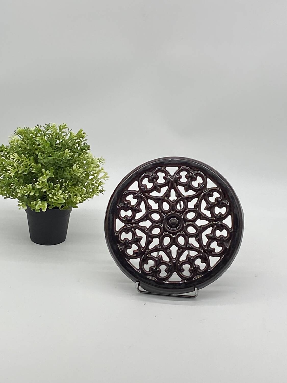 Brown enameled cast iron trivet vintage, old