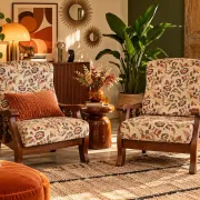 Pair of vintage 70s lounge chairs in wood & floral fabric