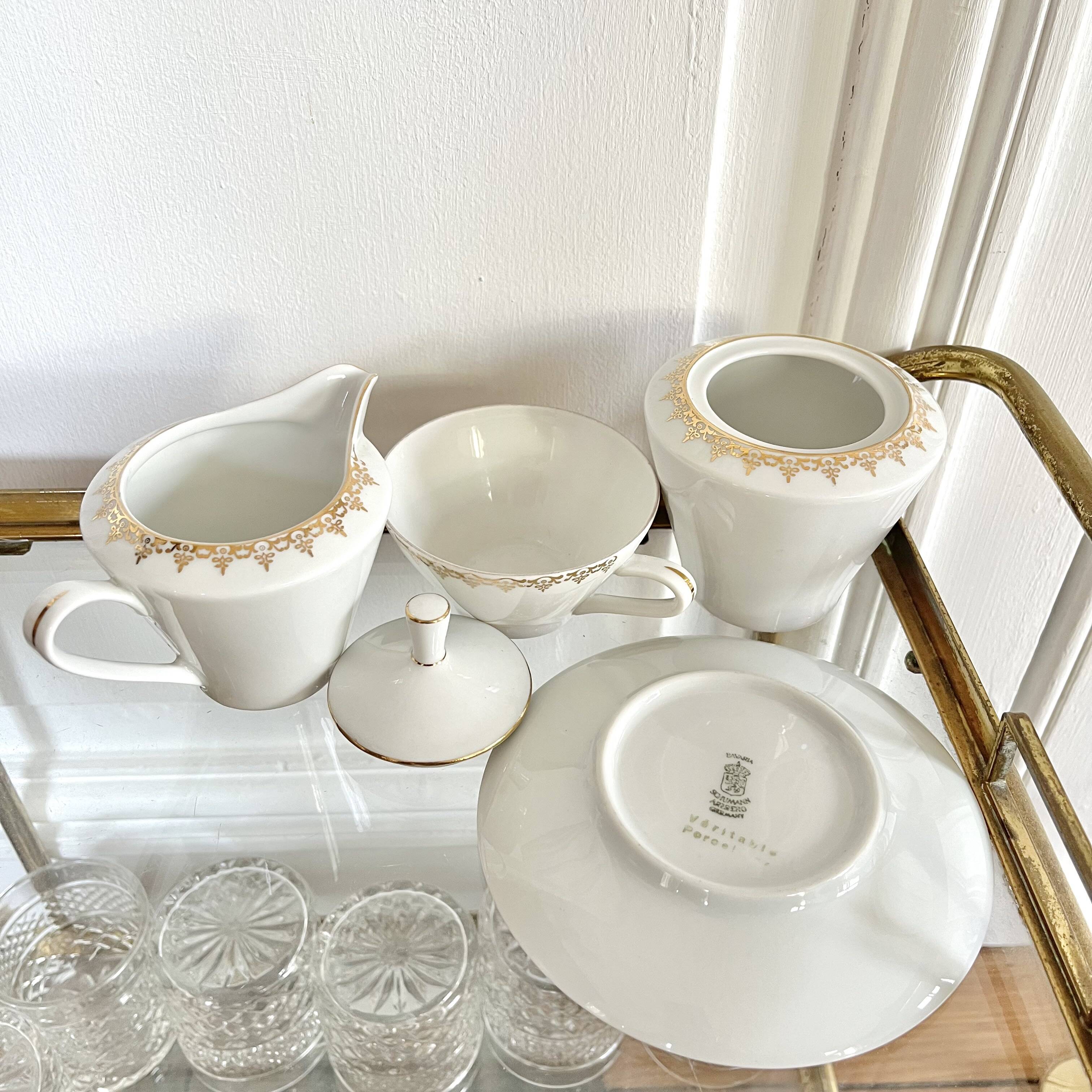 Porcelain sugar bowl and milk jug