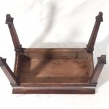 Small old side table with brass finishes