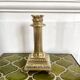 Empire style gold candle holder