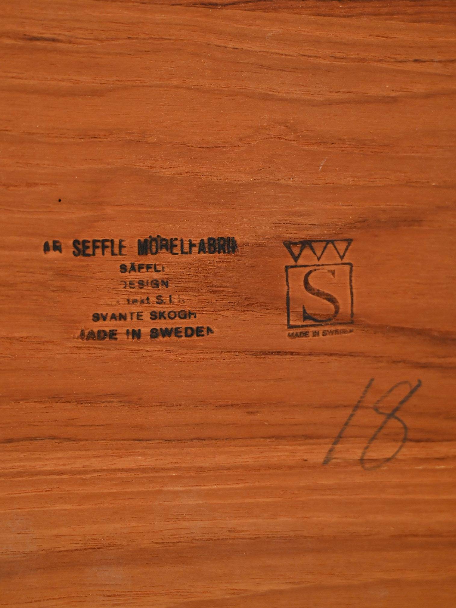 Round extendable teak table by Svante Skogh