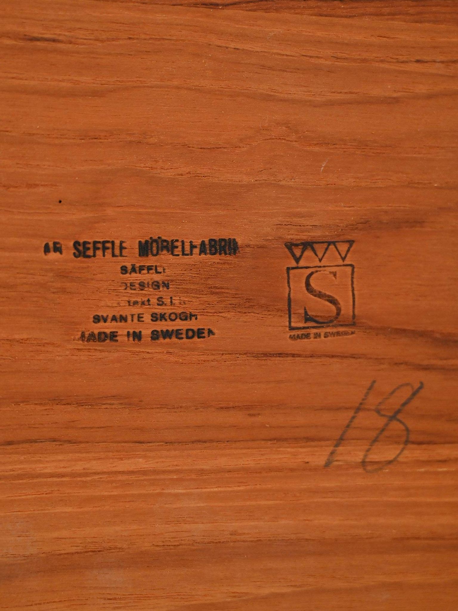 Round extendable teak table by Svante Skogh