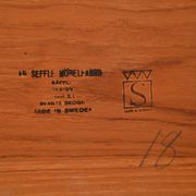Round extendable teak table by Svante Skogh