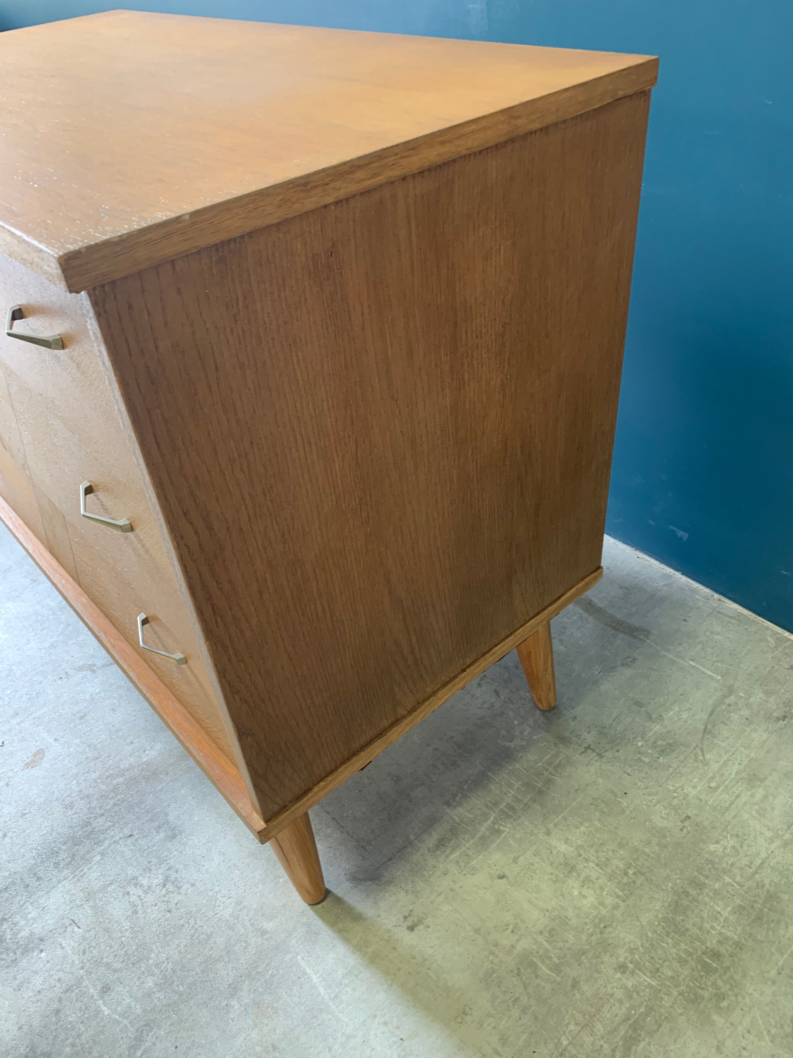 Vintage chest of drawers with wing drawers
