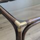 Bamboo coffee table with brass corners and smoked glass