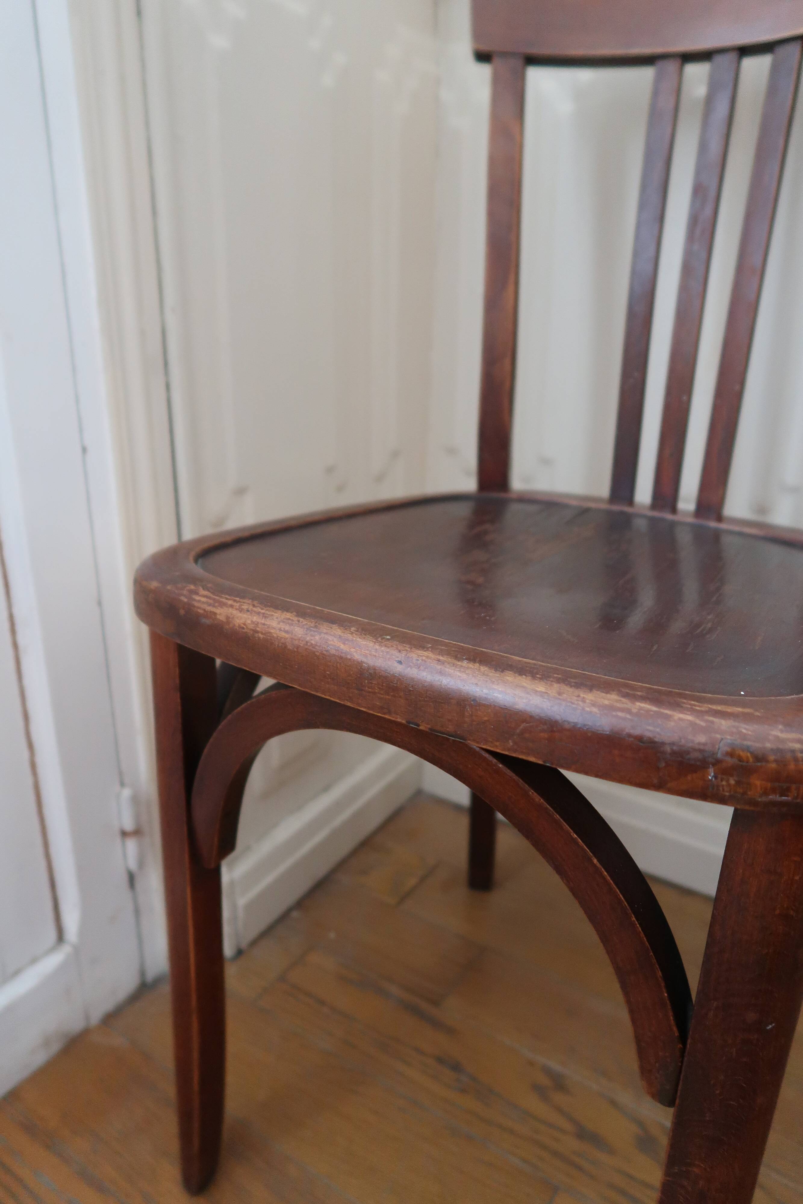 Pair of patinated bistro chairs