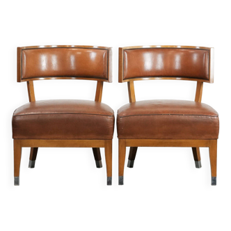 Set of 2 vintage design cocktail chairs/armchairs made of sheepskin leather