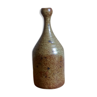 Bottled sandstone vase with a narrow neck