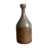 Bottled sandstone vase with a narrow neck