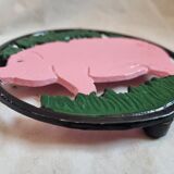 Cast iron underside, pink pig