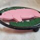 Cast iron underside, pink pig