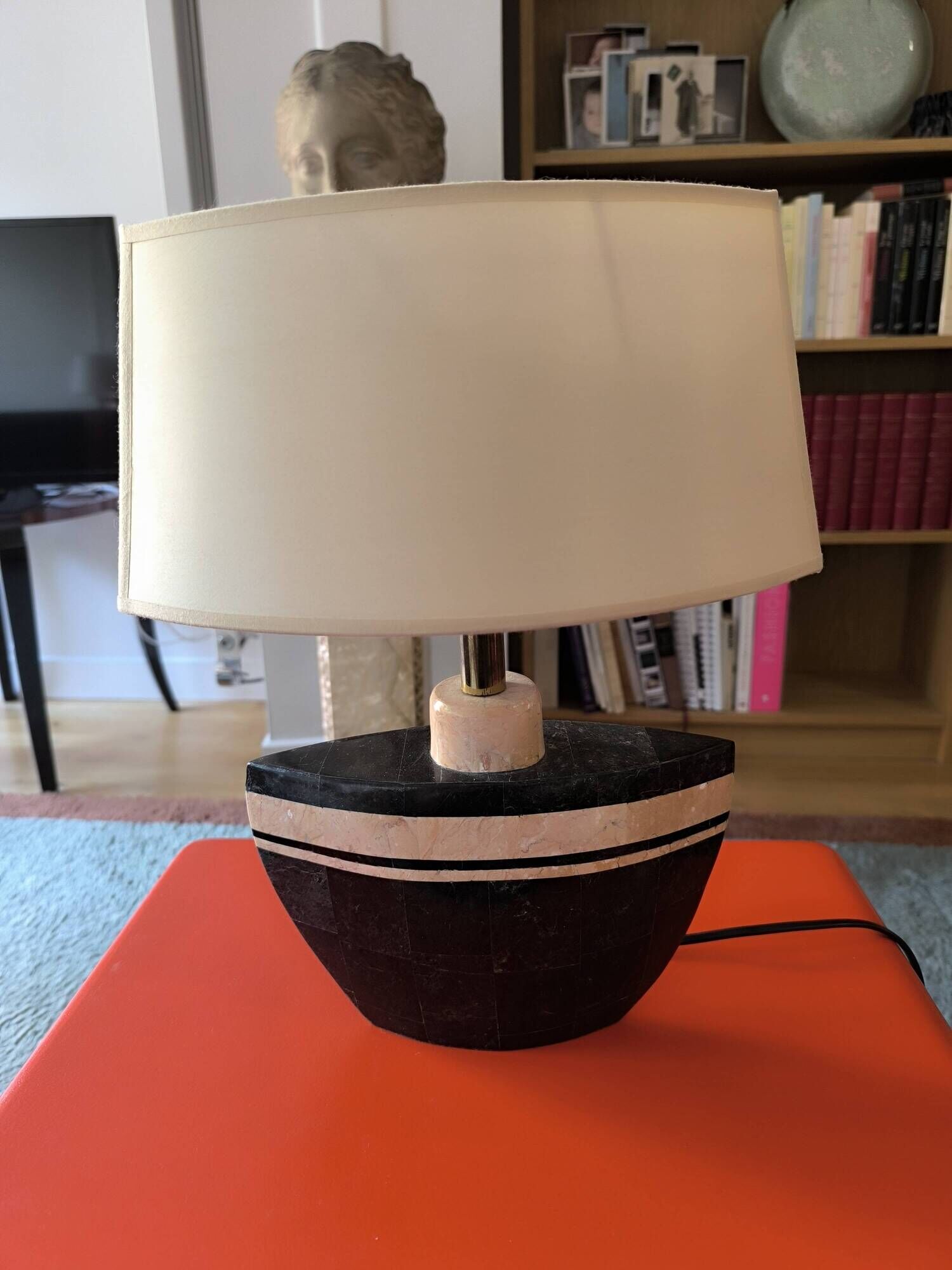 Table lamp in black and pink stone marquetry with a silk shade.