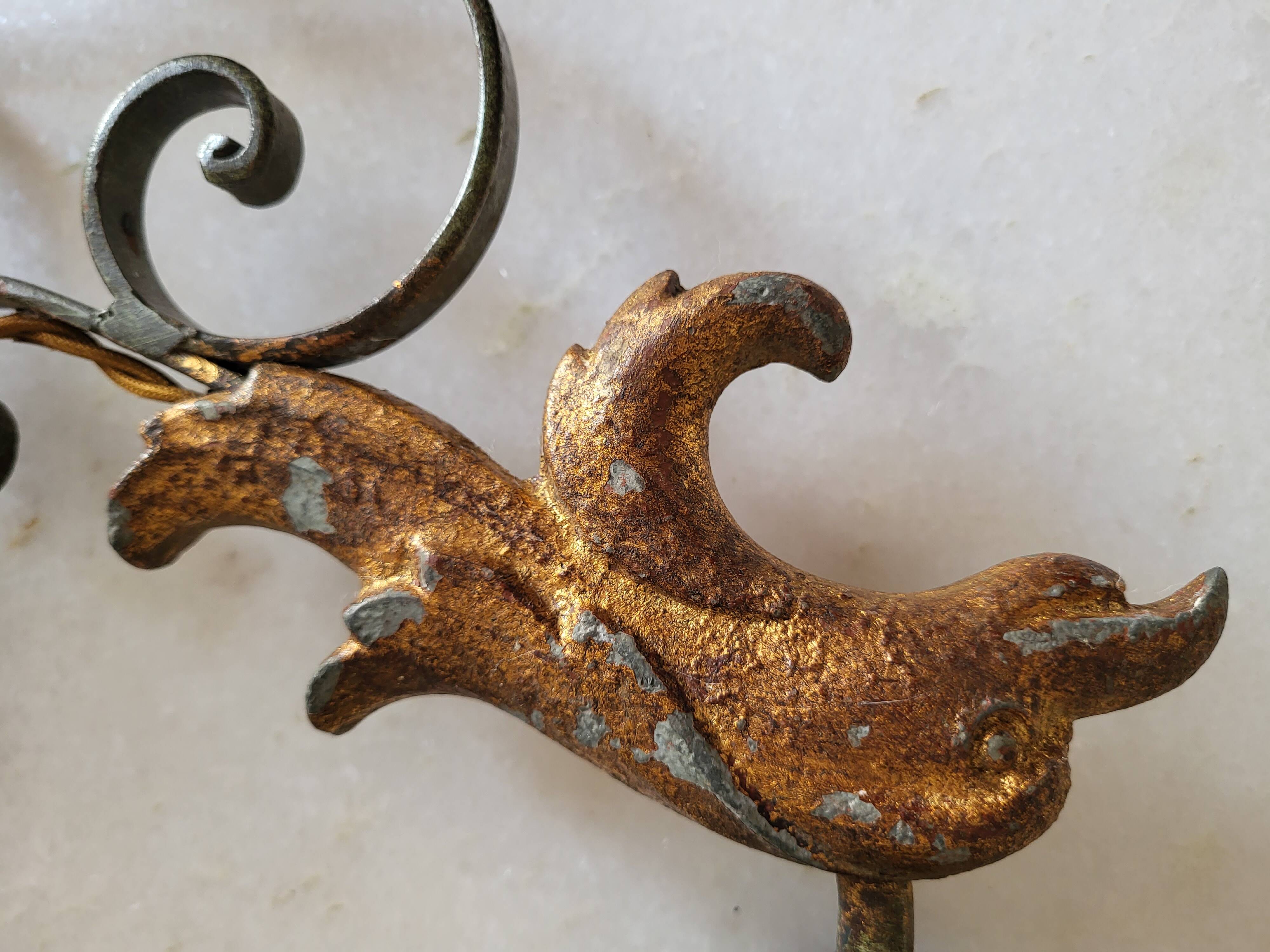 Pair of antique gilded wrought iron wall sconces with eagle heads