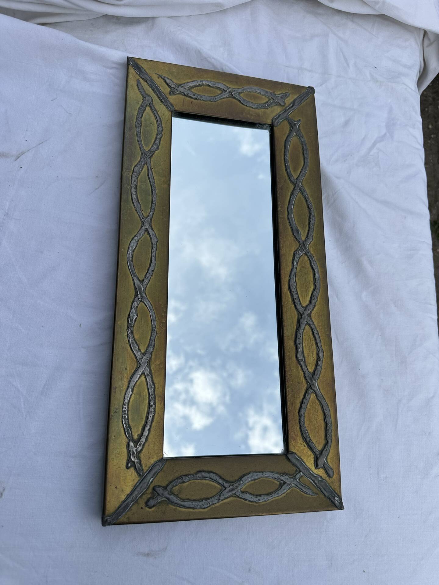 Brutalist mirror by Jean Goardere