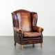 Comfortable cowhide wingback armchair in English style