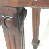 Small old side table with brass finishes