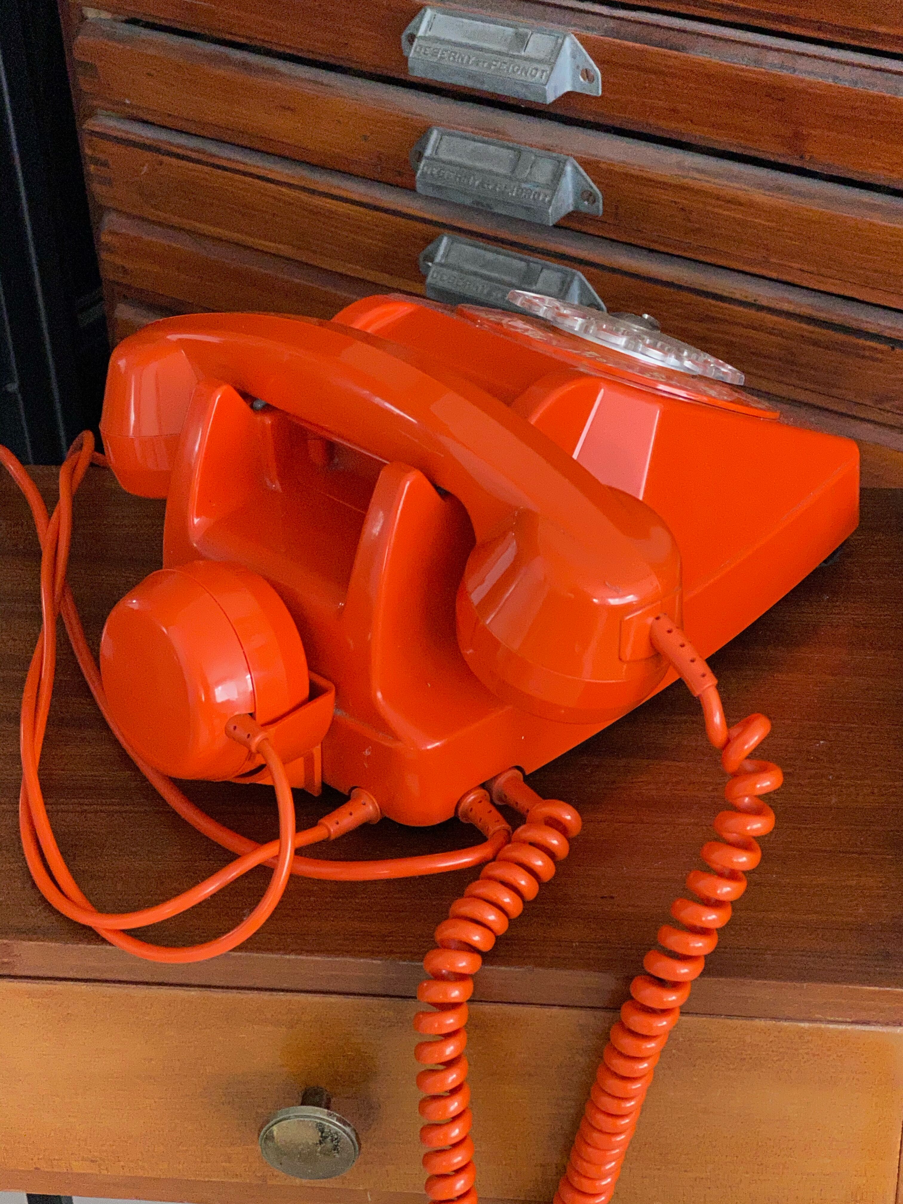 Vintage orange dial phone