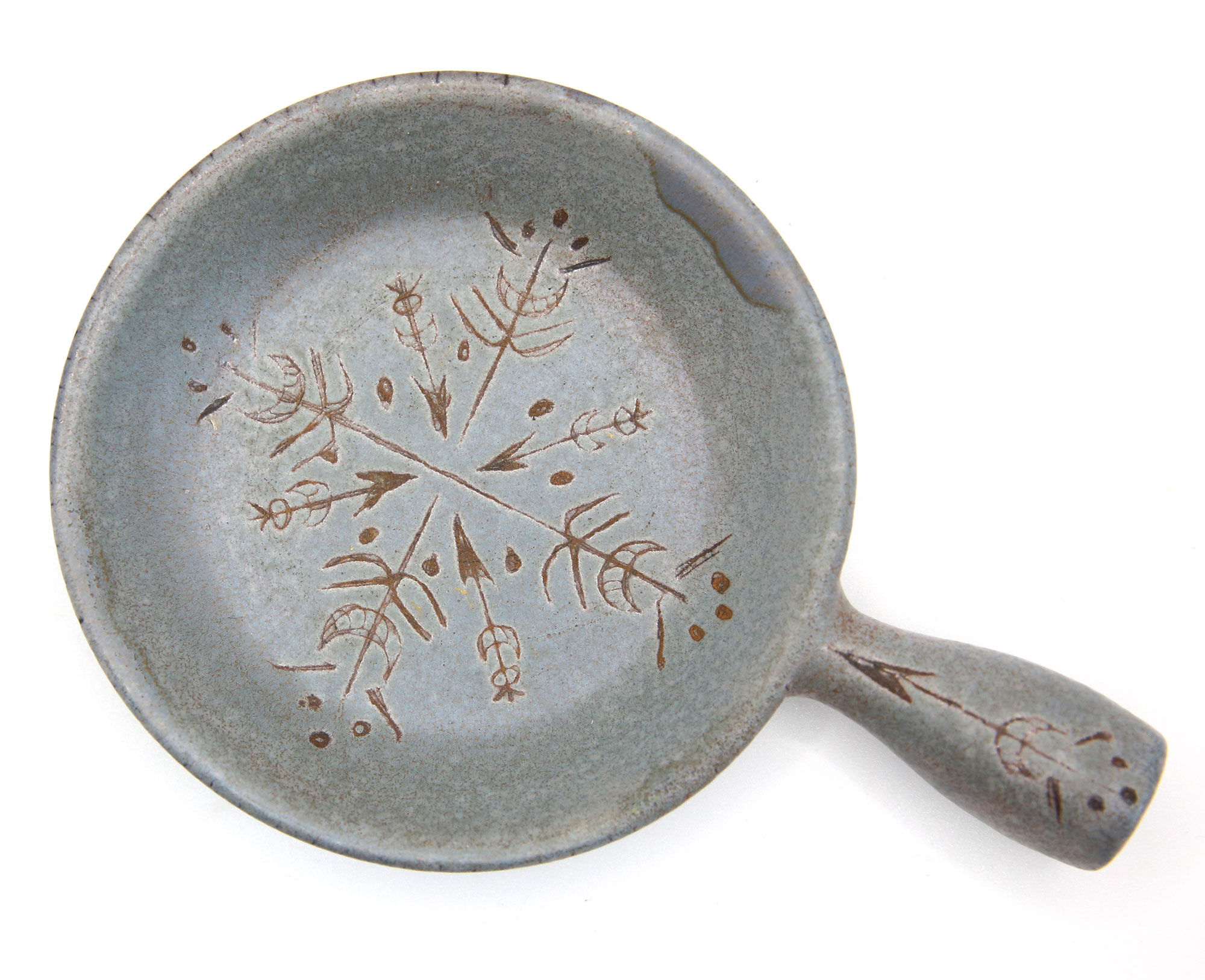 Poelon in grey sandstone like a pocket drain Le Triskel