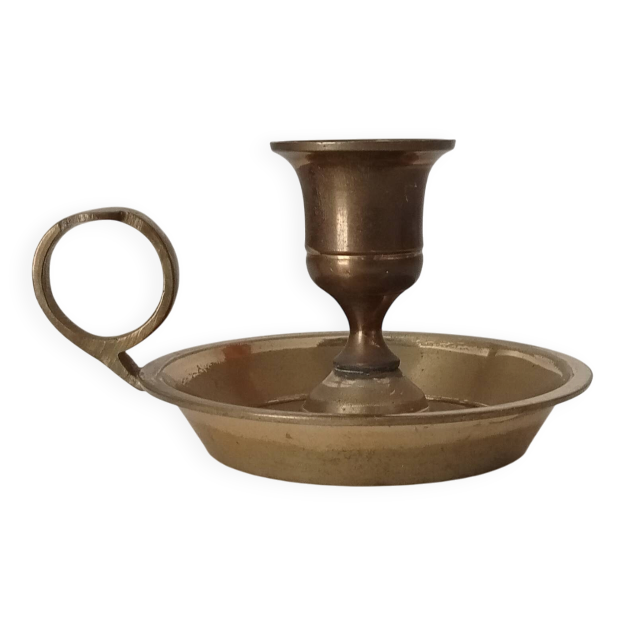 Vintage brass candle holder in gold.