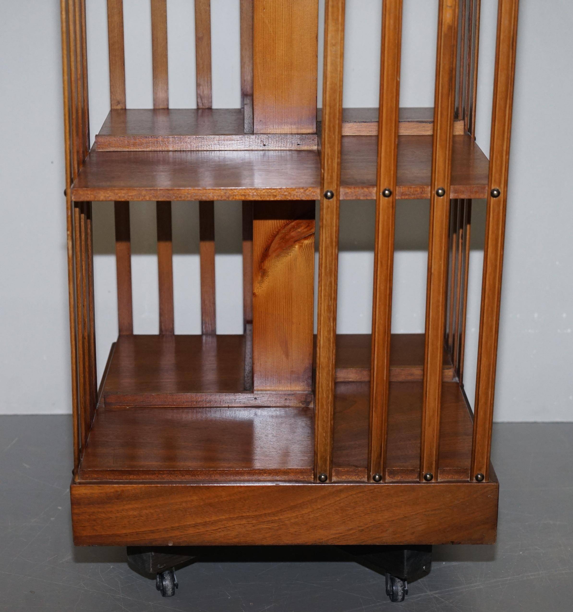 Edwardian revolving library in burl walnut with Sheraton inlay circa 1900