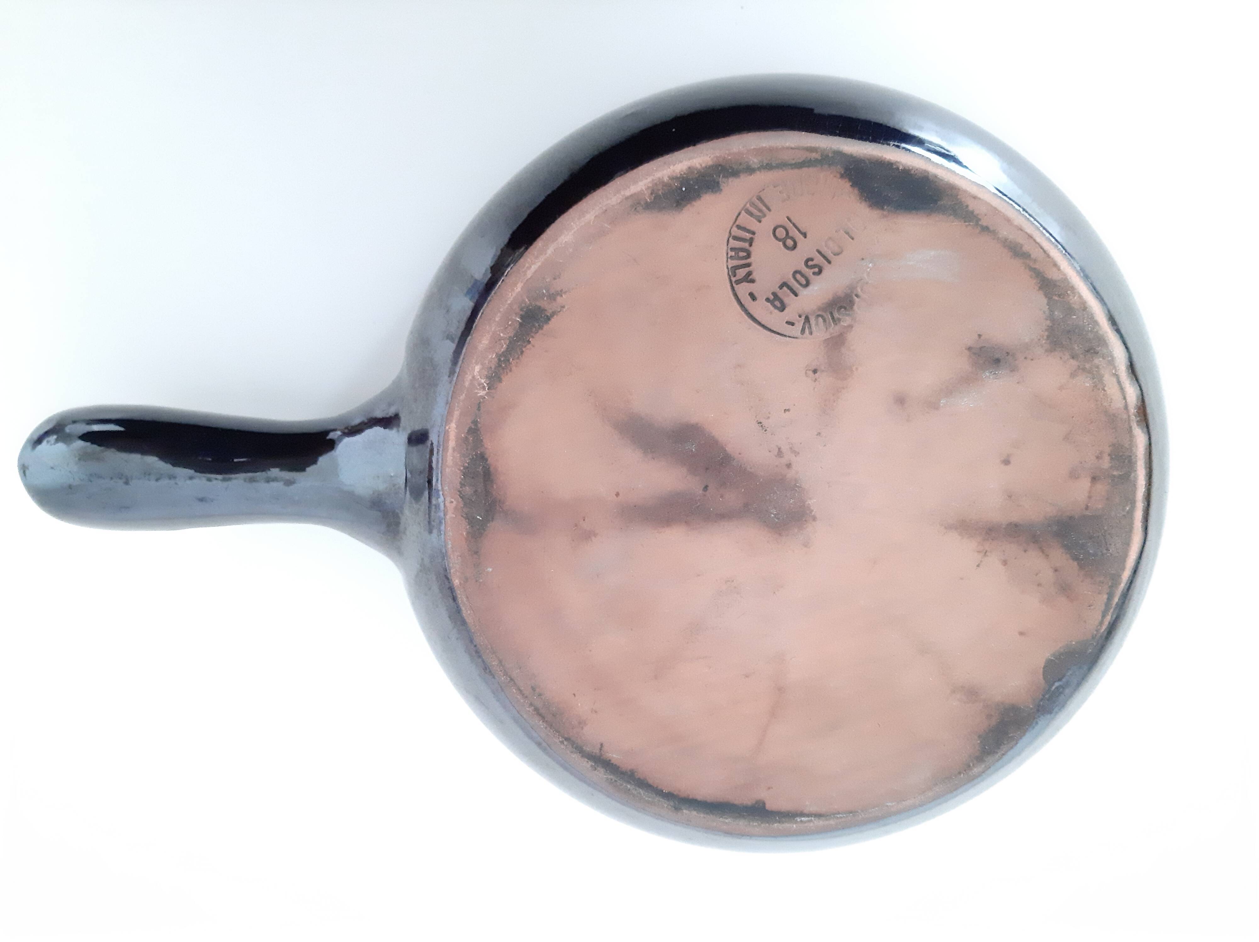 Old pan or pan in glazed earthened stoneware
