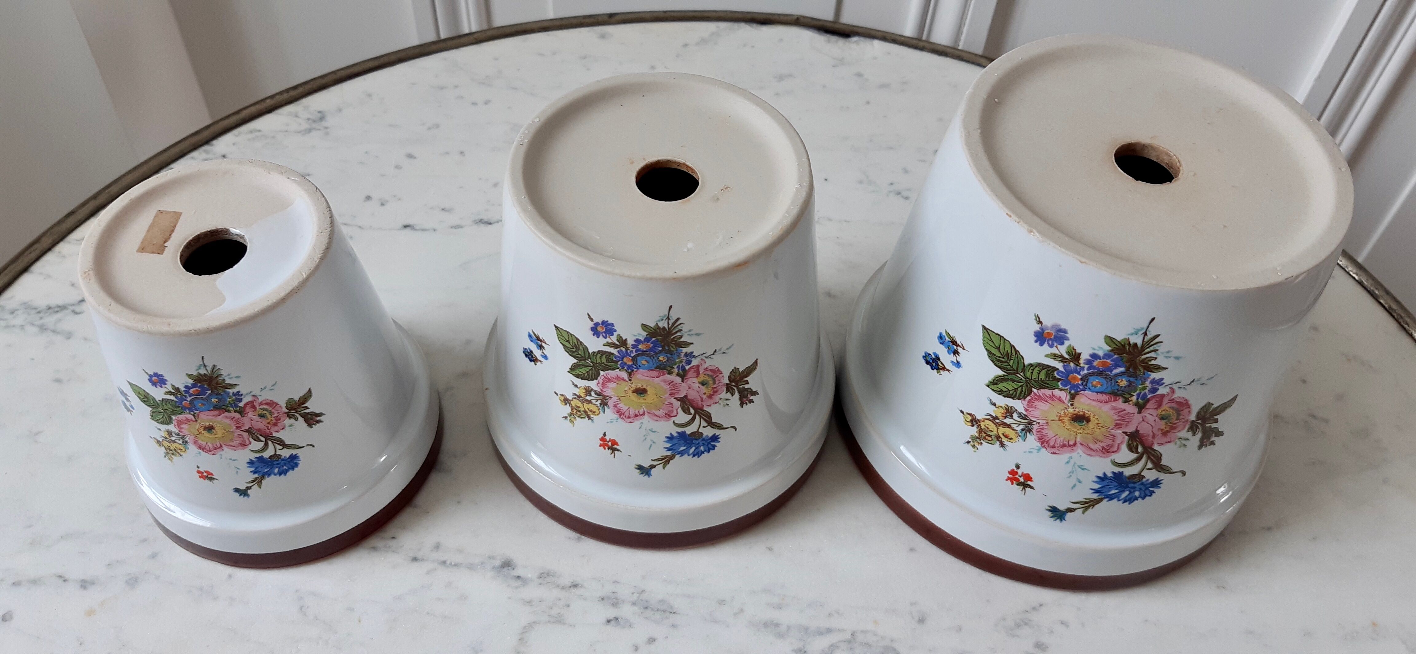 Trio of vintage flowered pot covers 60s