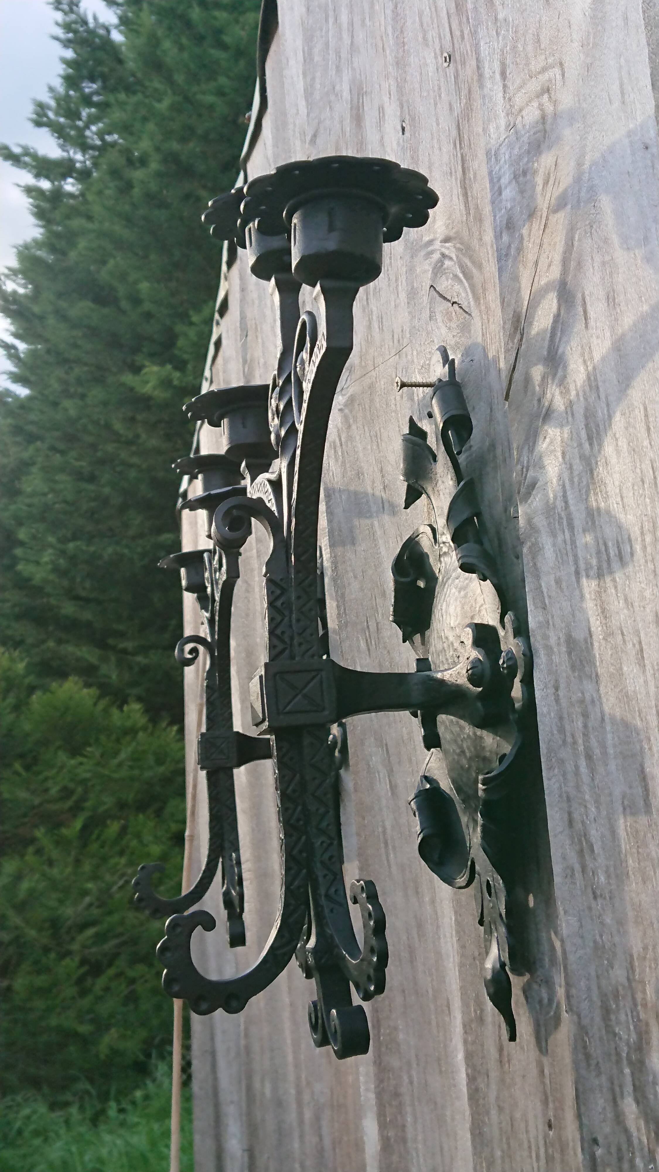 Pair of black wrought iron sconces - neo-Gothic style - from the 1950s