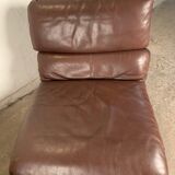 A pair of leather armchairs, Switzerland, 1970s