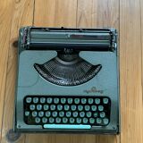 M.J. Rooy light green typewriter