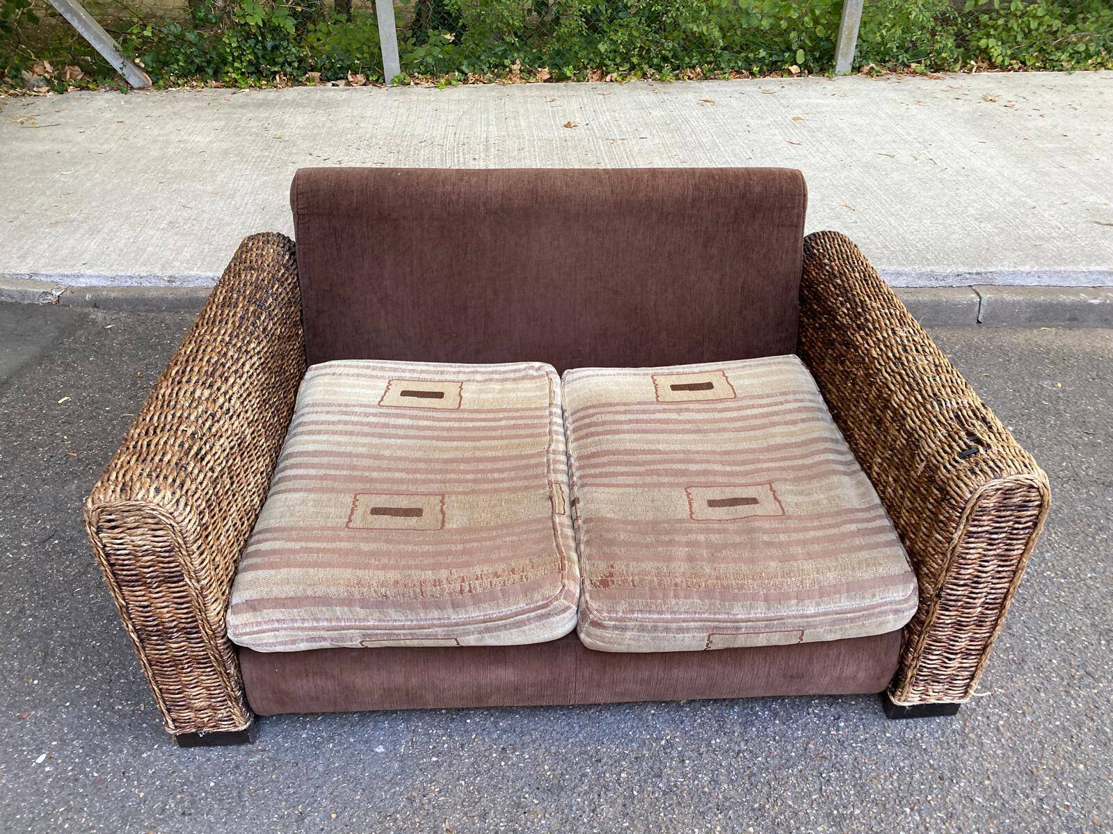 Exotic 2-seater sofa in woven banana tree / rattan and brown fabric.