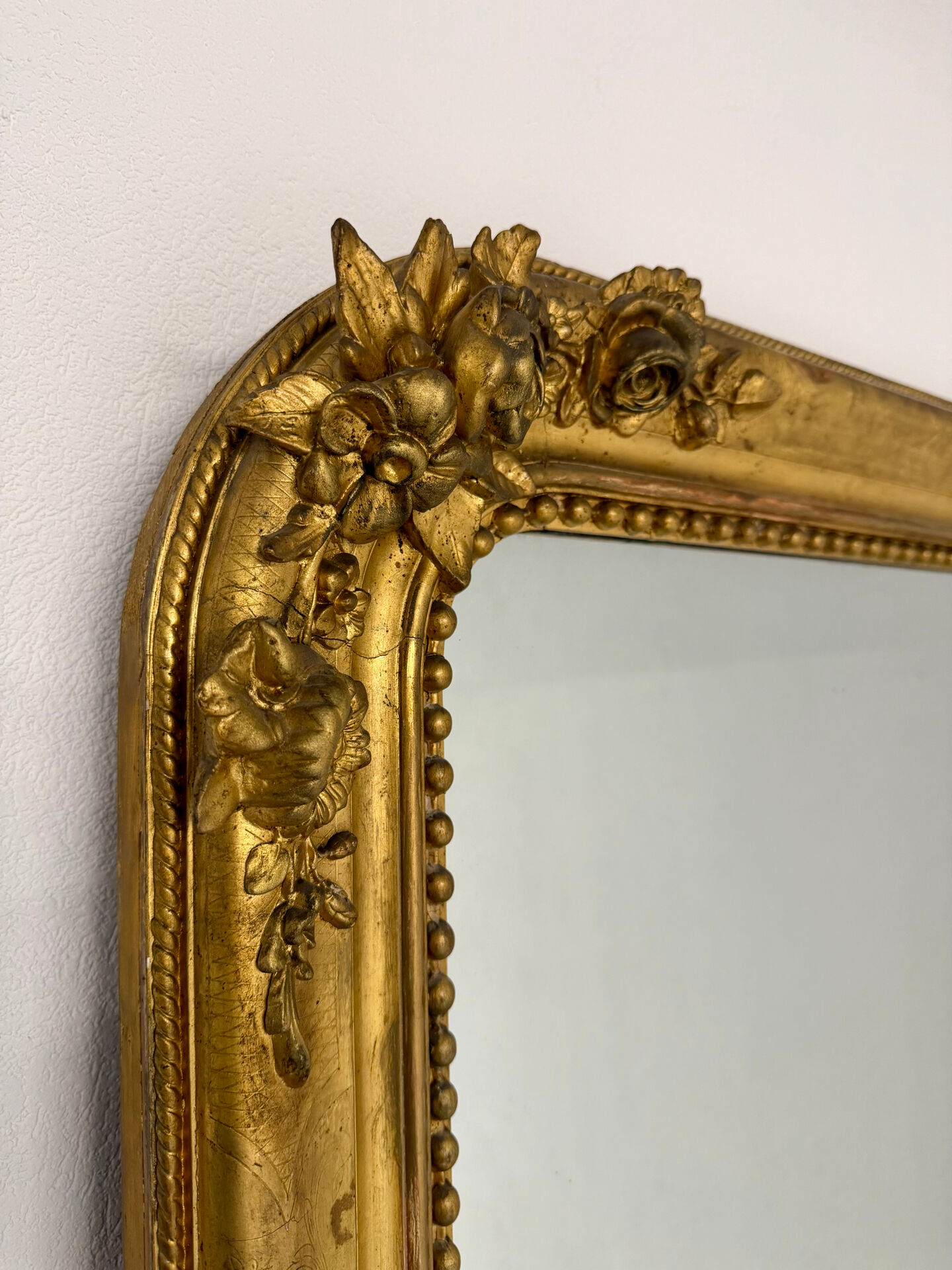 Large Napoleon III mirror with wooden gilded frame, 19th century, 200 cm.