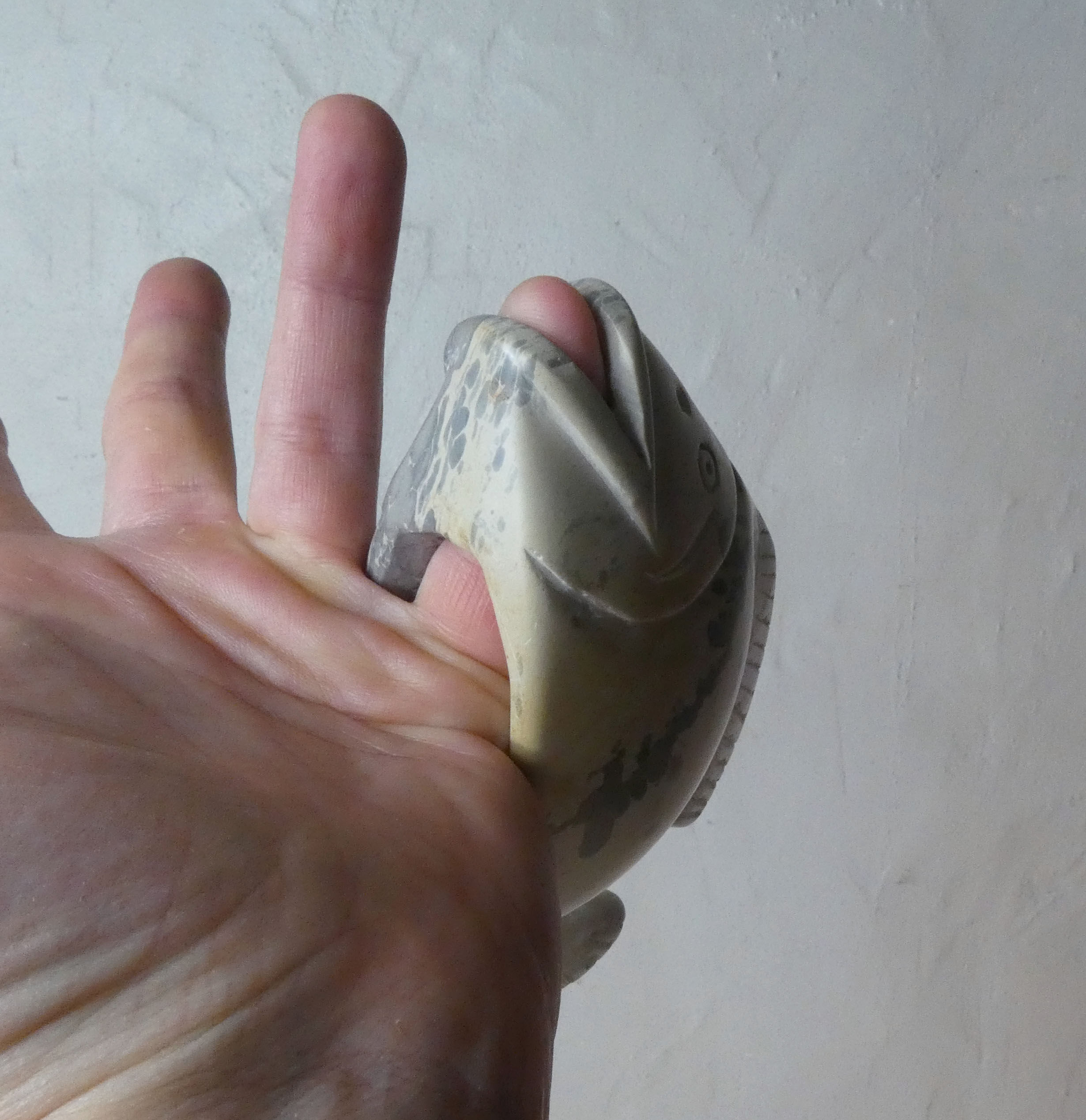 Polished stone fish vintage paper press