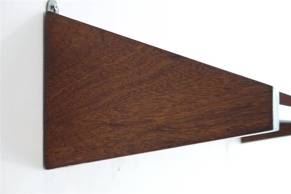 Minimalist mahogany shelves from the 1960s.