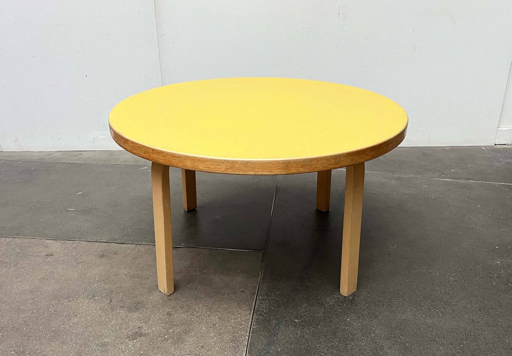 Mid-century modern yellow linoleum coffee table by Alva Aalto for Artek, Finland, 1960s.