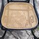 Rocking-chair noir canné bois courbé 1930