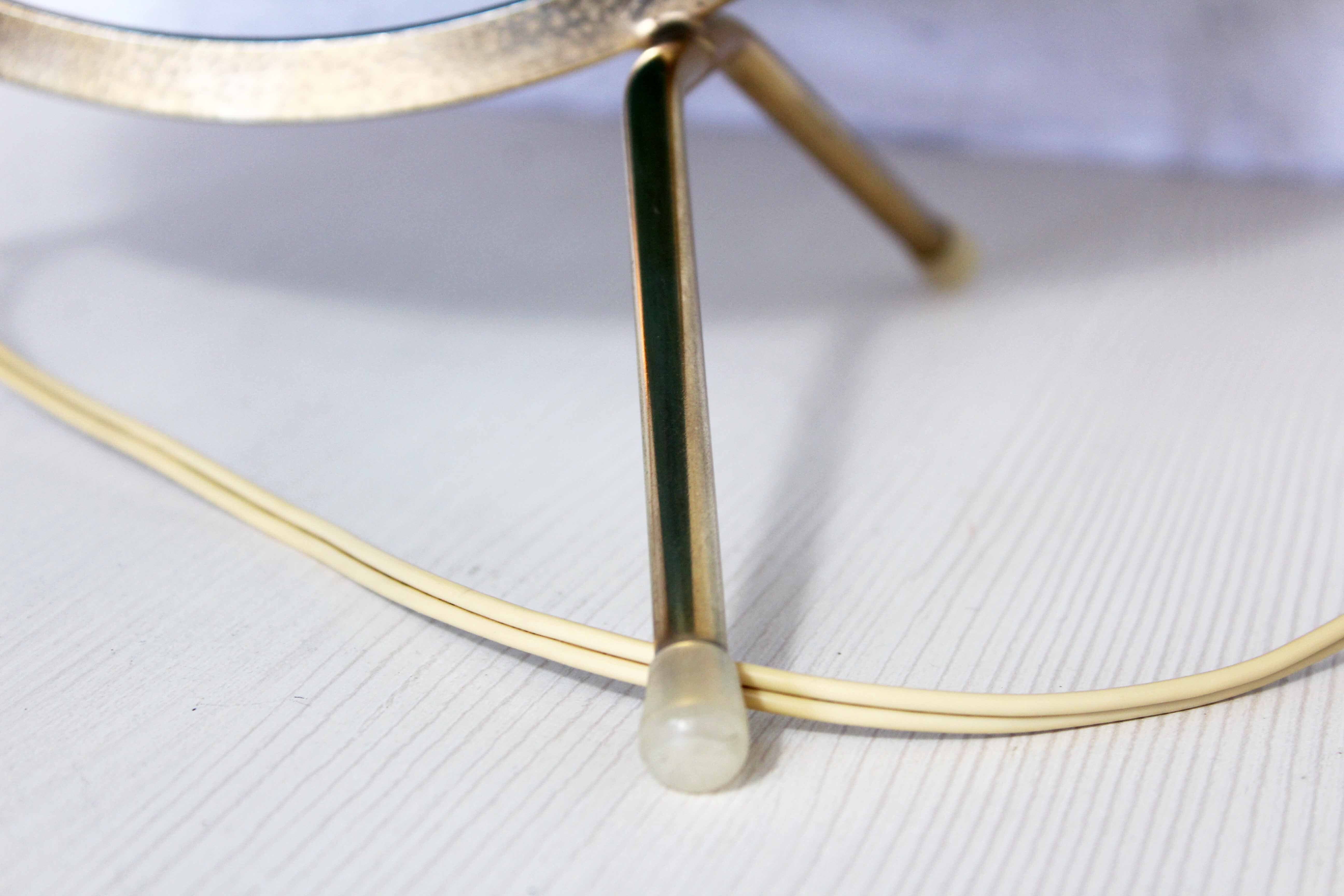 Luminous world map in tripod glass