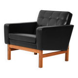 Swedish AB Futura teak and faux leather armchair