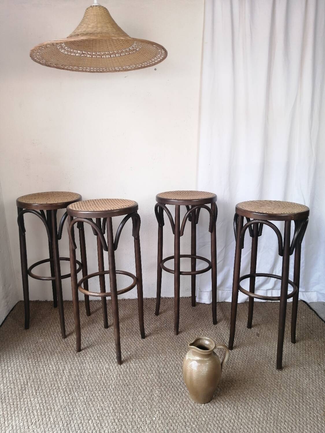 Set of 4 high bistro stools in curved wood and canework.