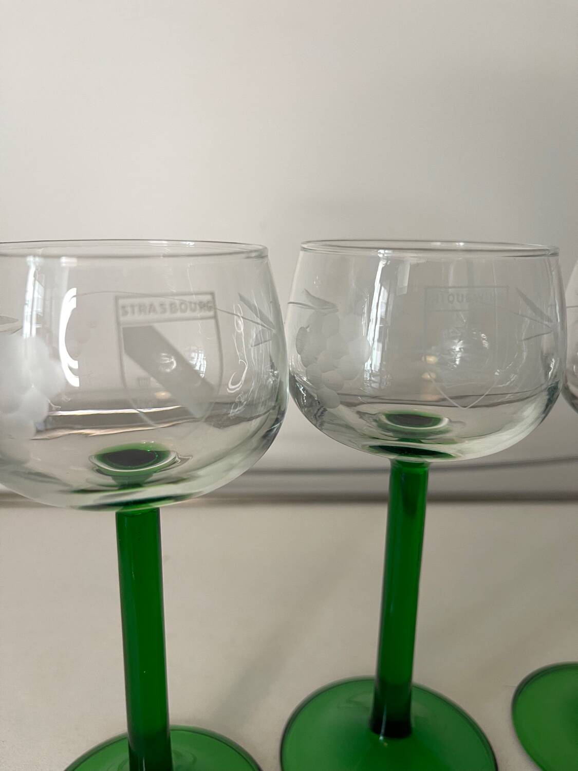 Set of 4 antique Alsace wine glasses, green stem and engraved decoration